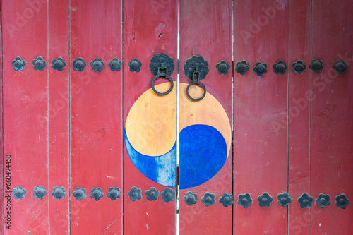 Korean traditional Taegeuk pattern main gate. A traditional Korean gate. photo