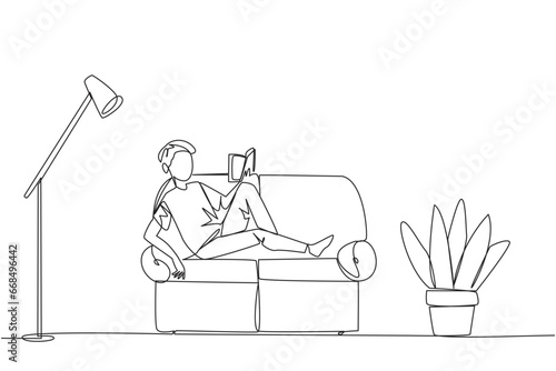 Single continuous line drawing man sitting stretched out on the sofa reading book. Really like the content of the book reading on each page. Impressive. Love read. One line design vector illustration