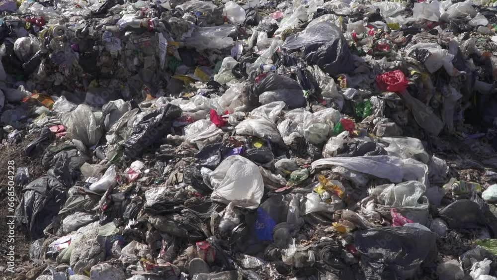 Closeup of plastic waste in a dumping ground. Closeup of plastic waste in a dumping ground.