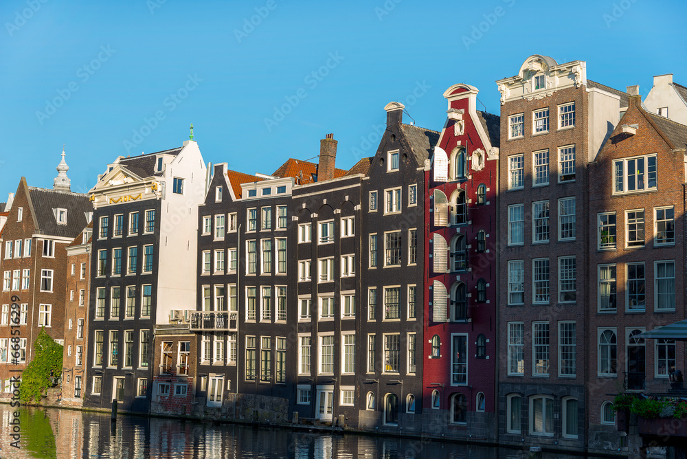 Traditional Dutch Baroque and Gothic old architecture in Amsterdam from 17th century.