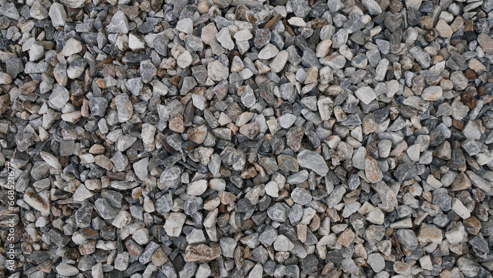Gravel texture. Small stones on the ground. Small stones background. Gravel texture. Small stones on the ground. Small stones background.