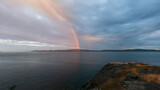 Rainbow in the distance taken from Salt Spring Island in British Columbia, Canada