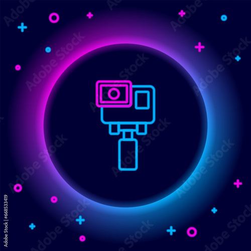 Glowing neon line Action extreme camera icon isolated on black background. Video camera equipment for filming extreme sports. Colorful outline concept. Vector