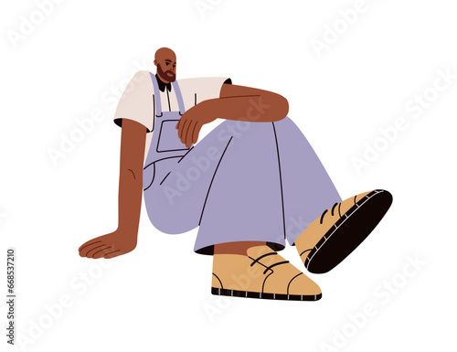 Modern man posing in casual outfit, jumpsuit. Young fashion model in trendy apparel sitting. Black male character in stylish casual clothes. Flat vector illustration isolated on white background