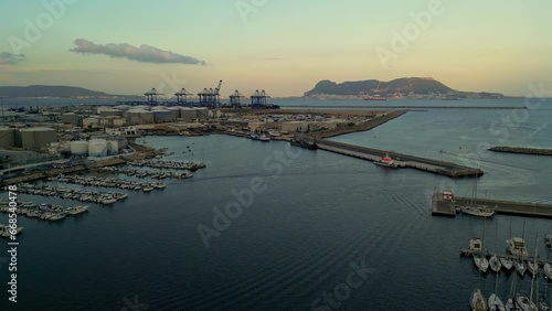Aerial view of the industrial port of Isla Verde, sunset in Algeciras, Spain