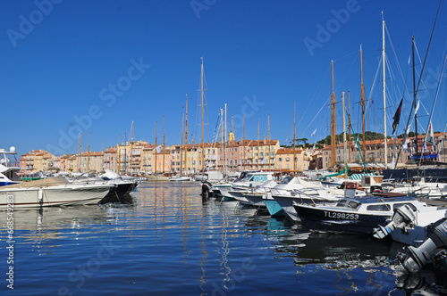 Boats parked at sea in the harbor in Saint Tropez, France.