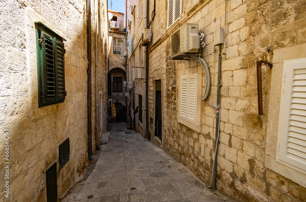 street view of the old town Dubrovnik, Croatia, medieval European architecture, narrow streets in historic city, the concept of traveling through the Balkans