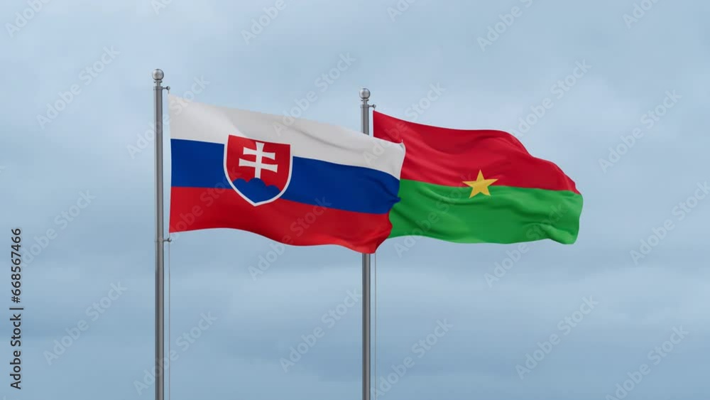 Burkina Faso flag and Slovakia flag waving together on cloudy sky, endless seamless loop, two country relations concept Burkina Faso flag and Slovakia flag waving together on cloudy sky, endless seamless loop, two country relations concept