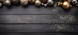 Christmas decor with gold & silver balls. Christmas decor on gray vintage wooden wall background minimalism photo texture. Horizontal banking poster background for advertisement. Photo AI Generated