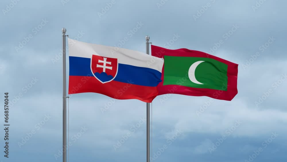 Maldives flag and Slovakia flag waving together on cloudy sky, endless seamless loop, two country relations concept Maldives flag and Slovakia flag waving together on cloudy sky, endless seamless loop, two country relations concept