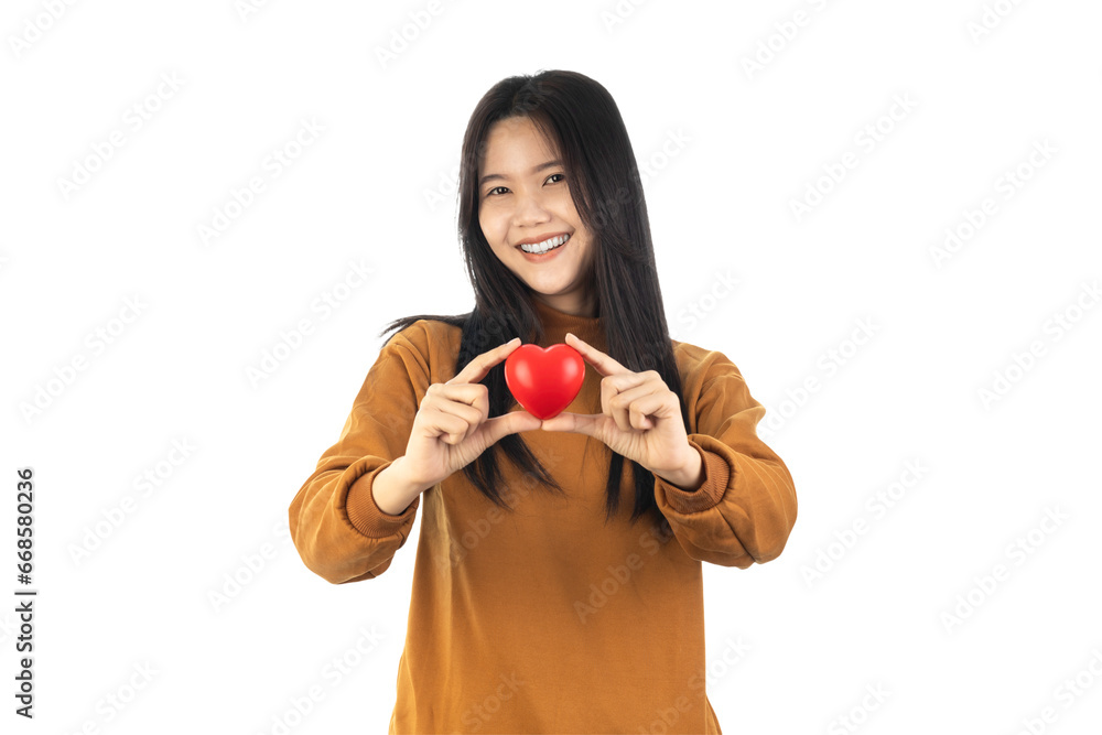 Asian Young Woman holding red heart isolated on white background with clipping path. health insurance, donation, happy charity volunteer concept, world mental health day, world heart day, csv concept Asian Young Woman holding red heart isolated on white background with clipping path. health insurance, donation, happy charity volunteer concept, world mental health day, world heart day, csv concept