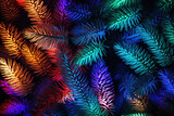 Abstract background of tropical palm leaves. Multicolored neon lights. 