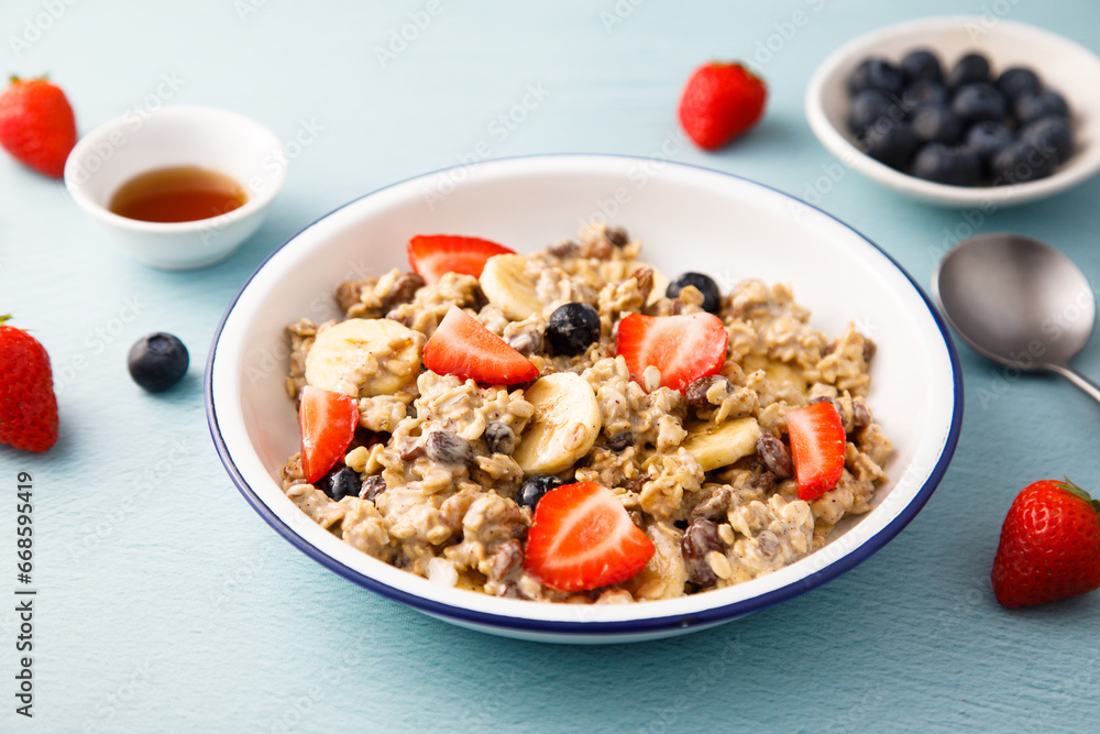Traditional overnight oats with berries and banana Traditional overnight oats with berries and banana