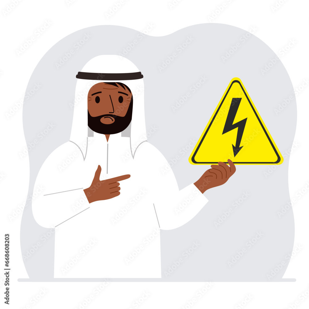 A man holds a yellow triangular warning sign with a black lightning in his hand. The concept of the danger of electric shock or high voltage.