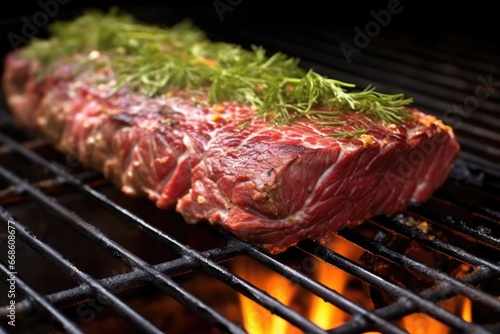 close view of a flipped steak on the grill