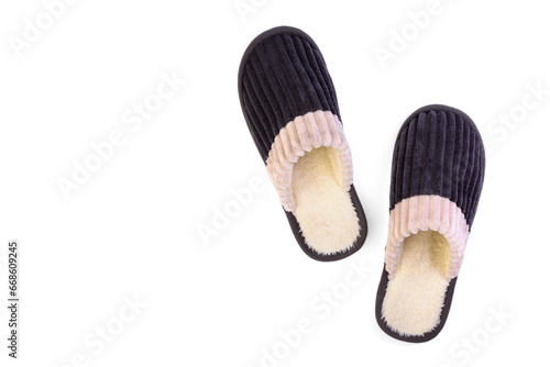 Men's grey house slippers isolated on white background with copy space.