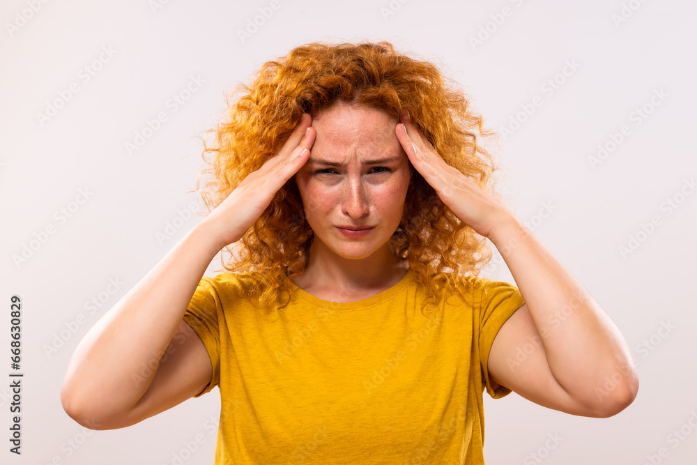 Ginger woman is having headache. Ginger woman is having headache.