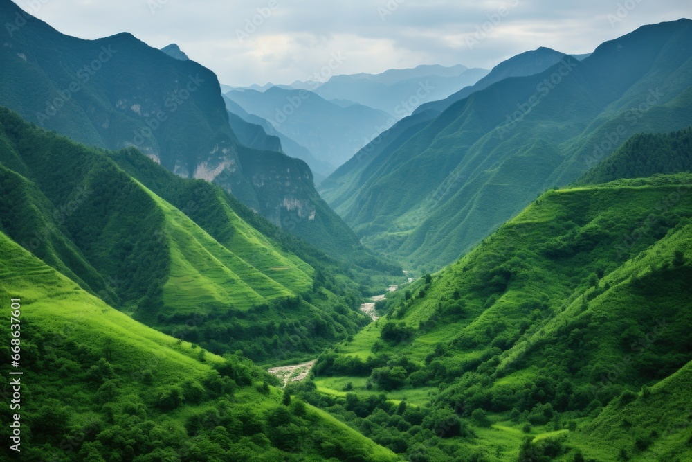 verdant valley surrounded by steep mountains