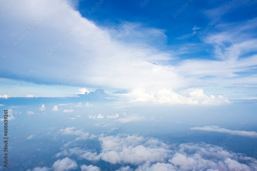 The view from the plane shows the beautiful blue sky The view from the plane shows the beautiful blue sky