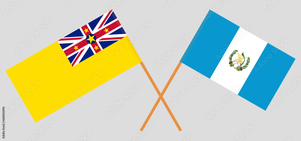 Crossed flags of Niue and Guatemala. Official colors. Correct proportion