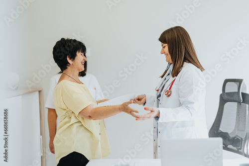 Experienced Doctor Sharing Positive Results with Elderly Patient.