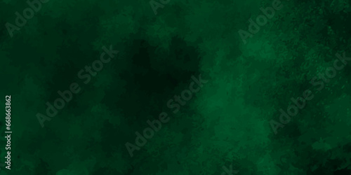 Elegant green background with marbled texture; old vintage grunge design; green Christmas background;Paint stains with spots, blots, grains, splashes. Colorful wallpaper. photo