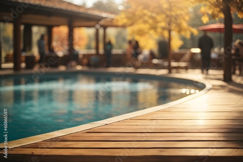 Empty wooden table top with swimming pool in background with bokeh autumn sunlight. Generative Ai.