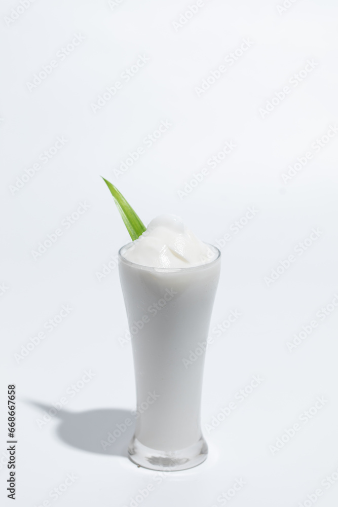 Coconut milk shake in a glass. Coconut milk shake in a glass.