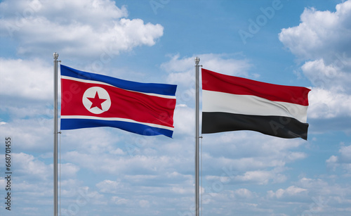 Yemen and North Korea flags, country relationship concept photo