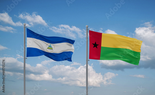 Guinea-Bissau and Nicaragua flags, country relationship concept