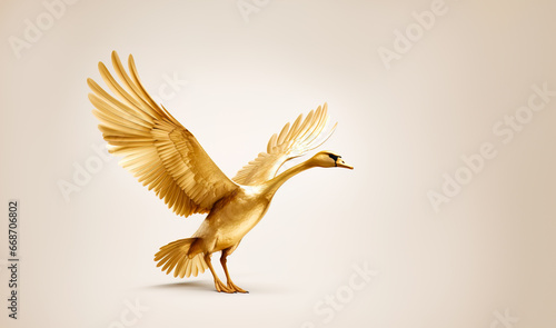 Golden goose taking flight photo