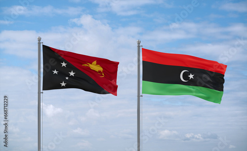 Libya and Papua New Guinea flags, country relationship concept