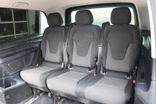 Photo of 9 person car rear seats.