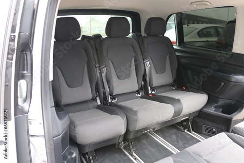 Photo of 9 person car rear seats.