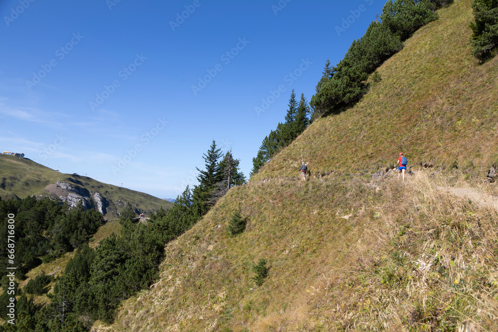 Hikers in the mountains, Stoos, Schwyz, Switzerland