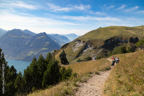 Hikers in the mountains, Stoos, Schwyz, Switzerland © JUAN