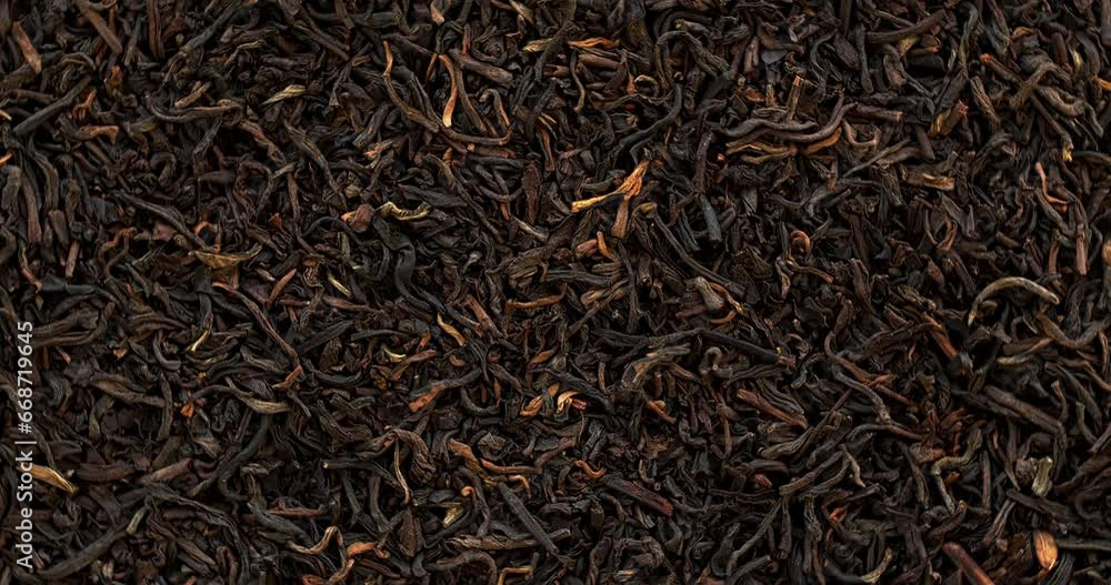 Top view of unpressed pu-erh tea background texture. Table spin. Seamless loop. Top view of unpressed pu-erh tea background texture. Table spin. Seamless loop.