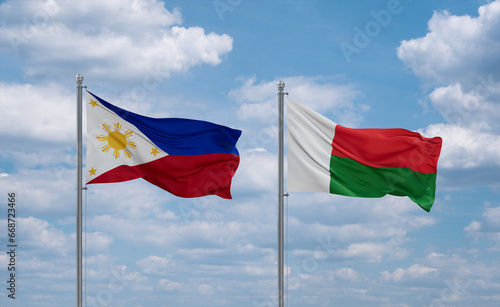 Madagascar and Philippines flags, country relationship concept