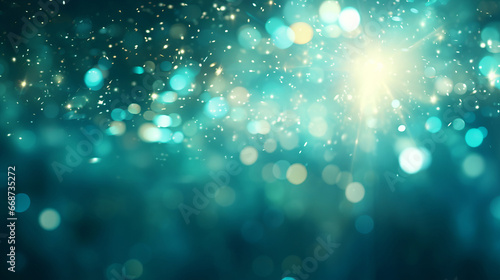 Teal glitter glow particle bokeh background. Festive celebration wallpaper concept