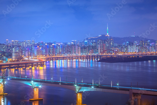 Photography Pictures of Seoul at night and Metro bridge over the Han River and Namsan Mountain in the background, South Korea