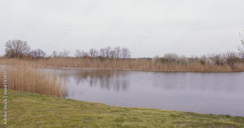 This captivating video provides a unique perspective, allowing you to behold the lake's winding beauty from a bird's-eye view. This captivating video provides a unique perspective, allowing you to behold the lake's winding beauty from a bird's-eye view.
