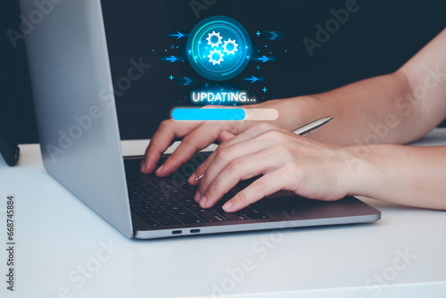 Operating system upgrade concept, installation app and software update process, modernize user equipment, update modern functions, developer released new version Improved security. User is downloading