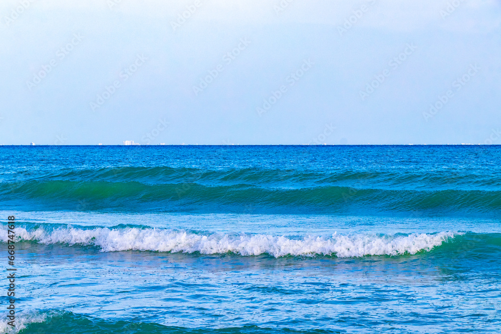 Waves at tropical beach caribbean sea clear turquoise water Mexico.