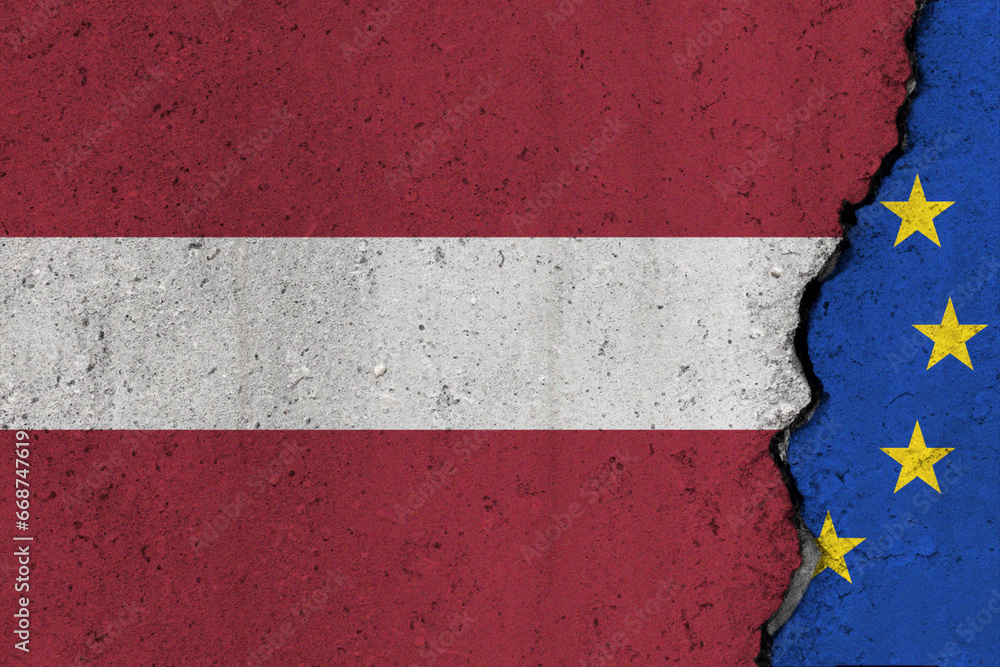 Latvia and EU flag cracked on a concrete background