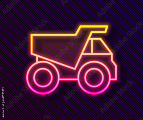 Glowing neon line Mining dump truck icon isolated on black background. Vector