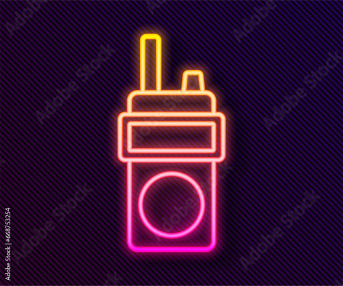 Glowing neon line Walkie talkie icon isolated on black background. Portable radio transmitter icon. Radio transceiver sign. Vector