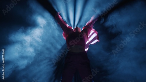 Photography Silhouette of a woman dancing jazz-funk in a studio