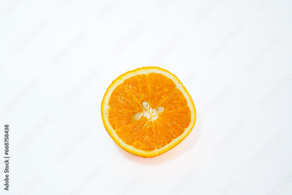 Cut open orange with white background. Cut open orange with white background.