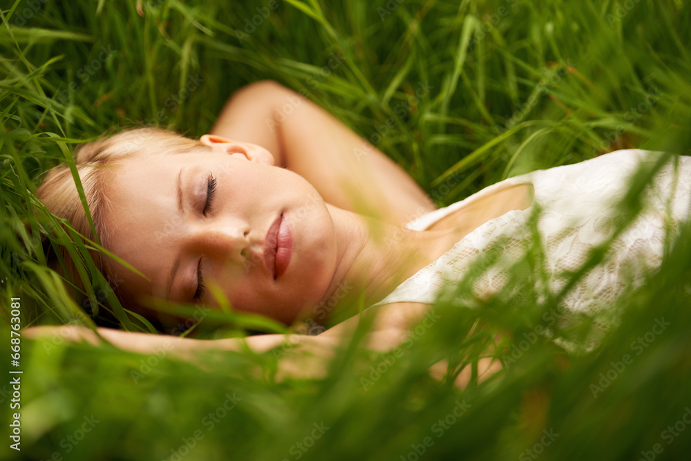 Nature face, grass field and relax woman sleep, tired or leisure for outdoor wellness, calm wellbeing or countryside peace. Girl dream, freedom and park break with green lawn, pitch or garden growth Nature face, grass field and relax woman sleep, tired or leisure for outdoor wellness, calm wellbeing or countryside peace. Girl dream, freedom and park break with green lawn, pitch or garden growth