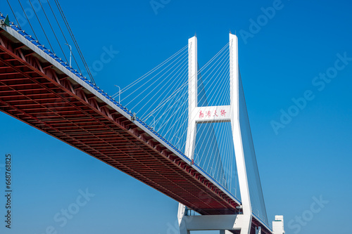 Nanpu Bridge on the Huangpu River in Shanghai, China © youm